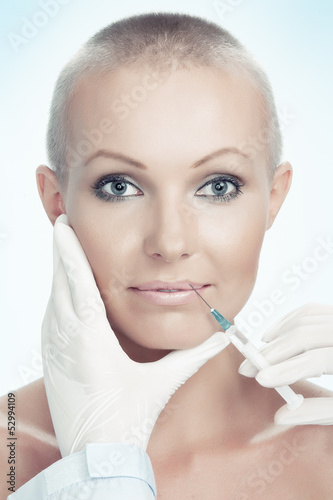 portrait of young beautiful woman being treated