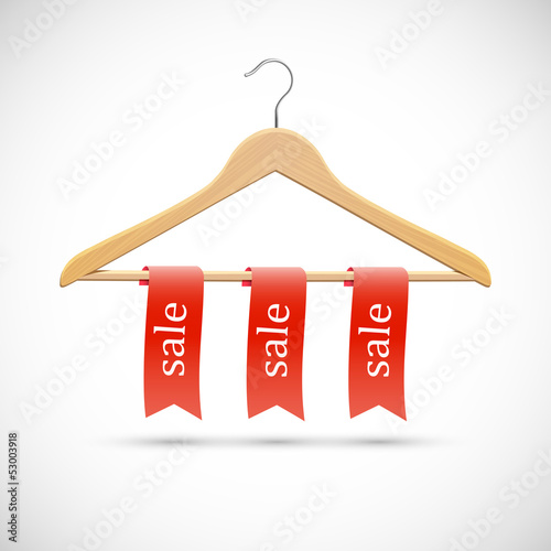 Sale concept - wooden hangers  with red ribbons