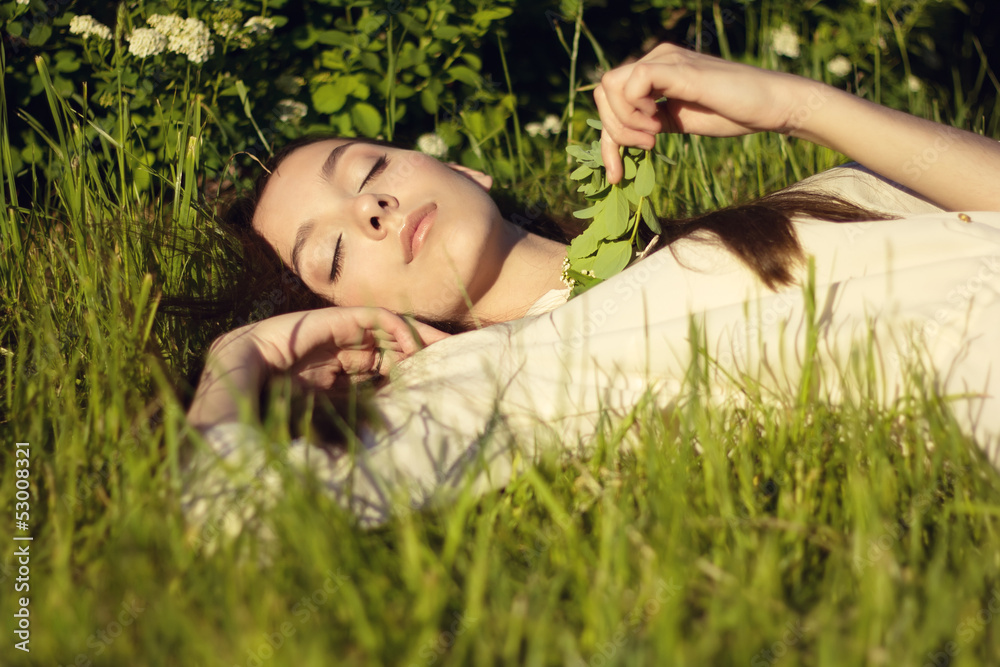 Beautiful girl relaxing outdoor, having fun, harmony concept Beautiful girl relaxing outdoor, having fun, harmony concept