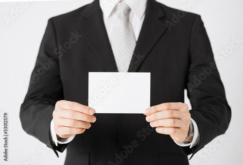 man hand with blank paper