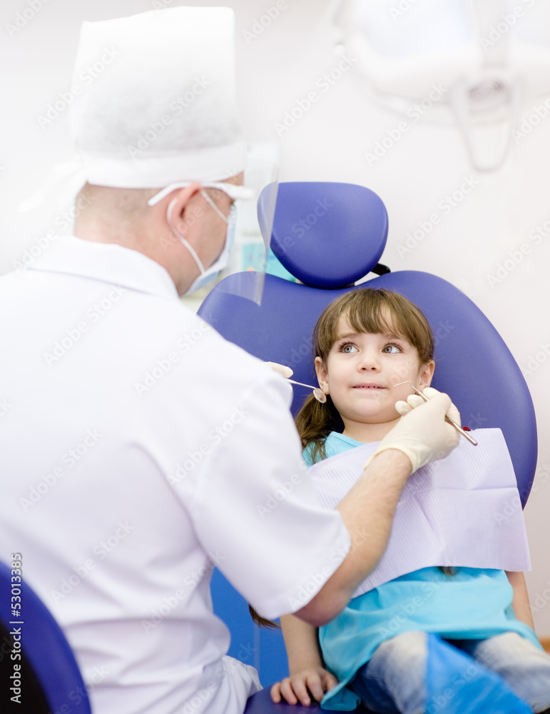 little girl during inspection of oral cavity little girl during inspection of oral cavity