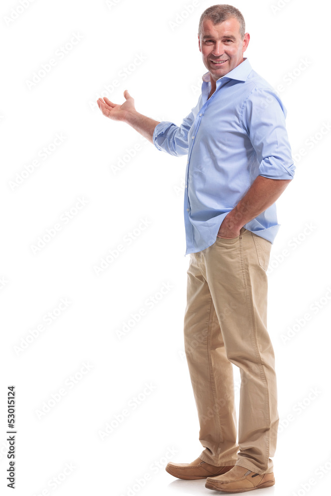 casual middle aged man presents in the back casual middle aged man presents in the back