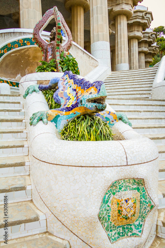 Colorful mosaic dragon in the fountain of park Guell, designed b