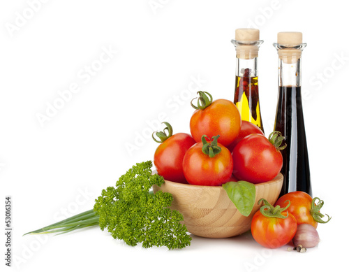 Fototapeta Naklejka Na Ścianę i Meble -  Ripe tomatoes, basil, parsley green onion