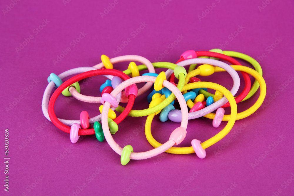 Naklejka premium Scrunchies on a pink background