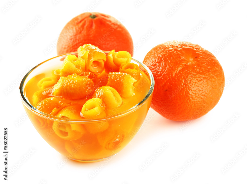 Orange jam with zest and tangerines, isolated on white Orange jam with zest and tangerines, isolated on white