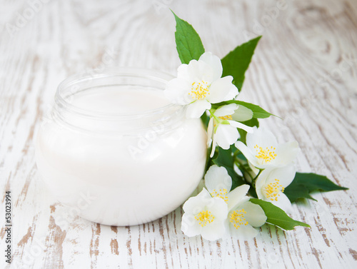 face cream with jasmine flowers