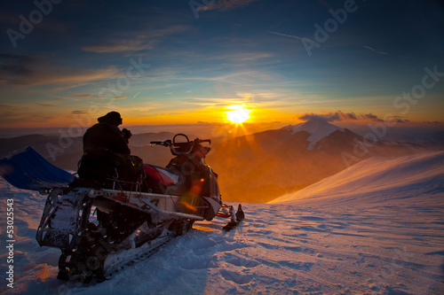 The snowmobile on a beautiful winter landscape photo