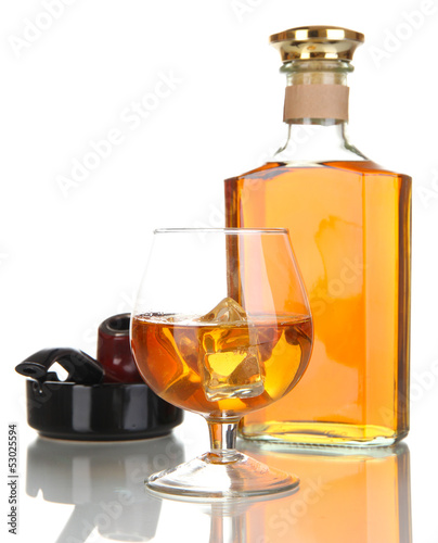 Brandy with ice and cigar isolated on white