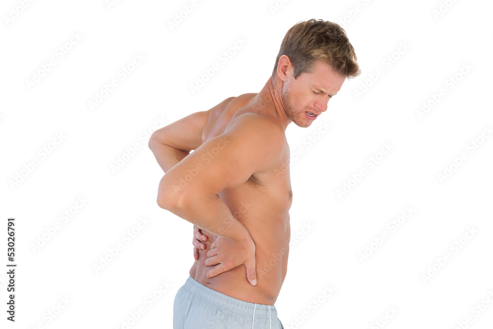 Topless man suffering from back pain Topless man suffering from back pain