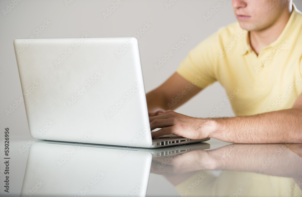 Naklejka premium Man with laptop