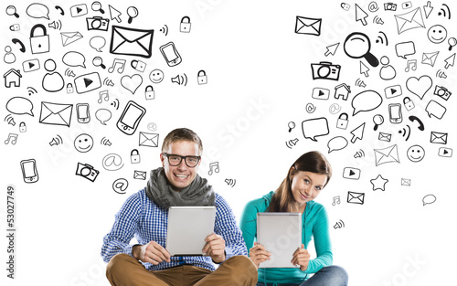 Young couple with tablets