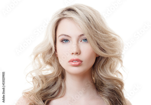 Beautiful Blonde Girl. Healthy Long Curly Hair.
