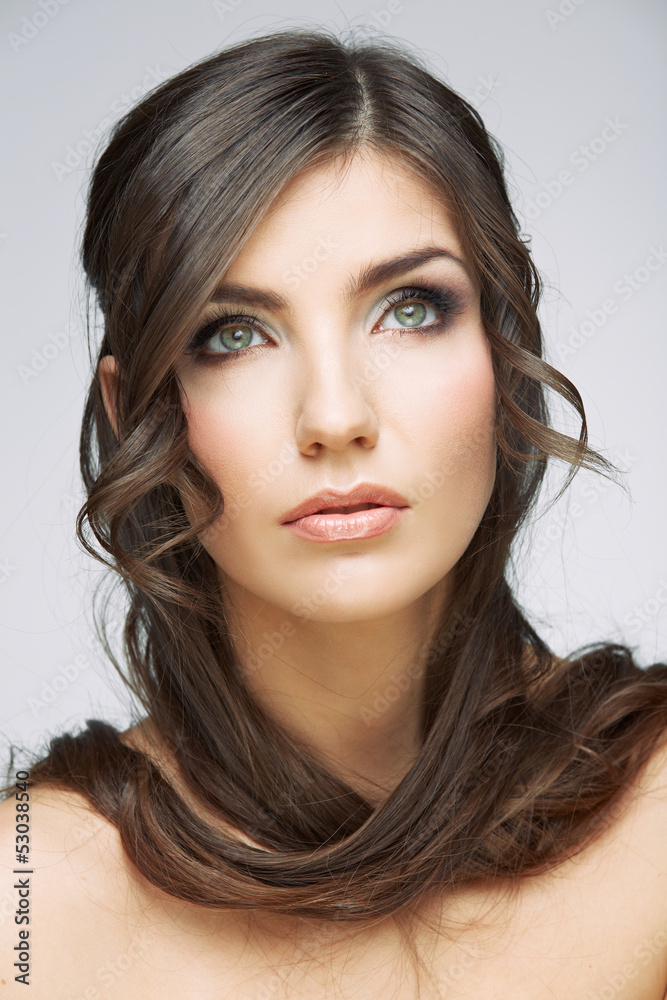 Fototapeta premium Woman face close up beauty portrait. Girl with long hair lookin