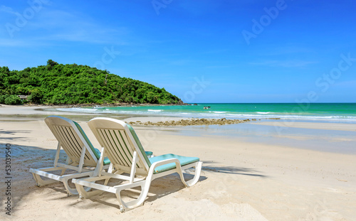 Two beach chairs © wiratgasem