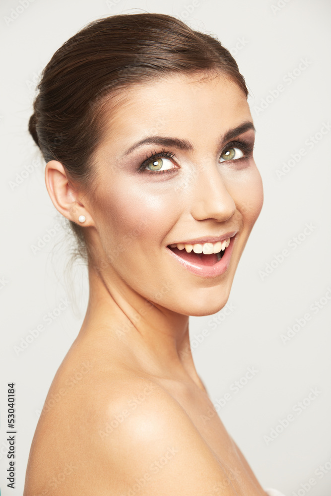 Young woman smiling face isolated on white background. Young woman smiling face isolated on white background.