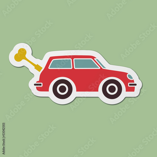 Spring toy car with key printed on contoured cardboard