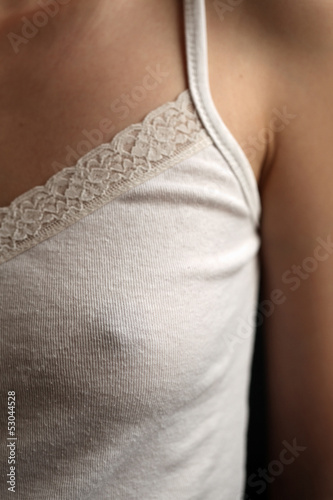 Female Breast in Tank Top