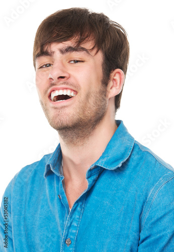 Portrait of a young man laughing