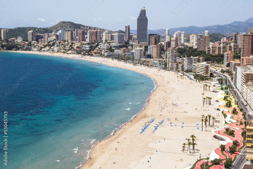 Hotels and beach of Benidorm. Sky and sea.