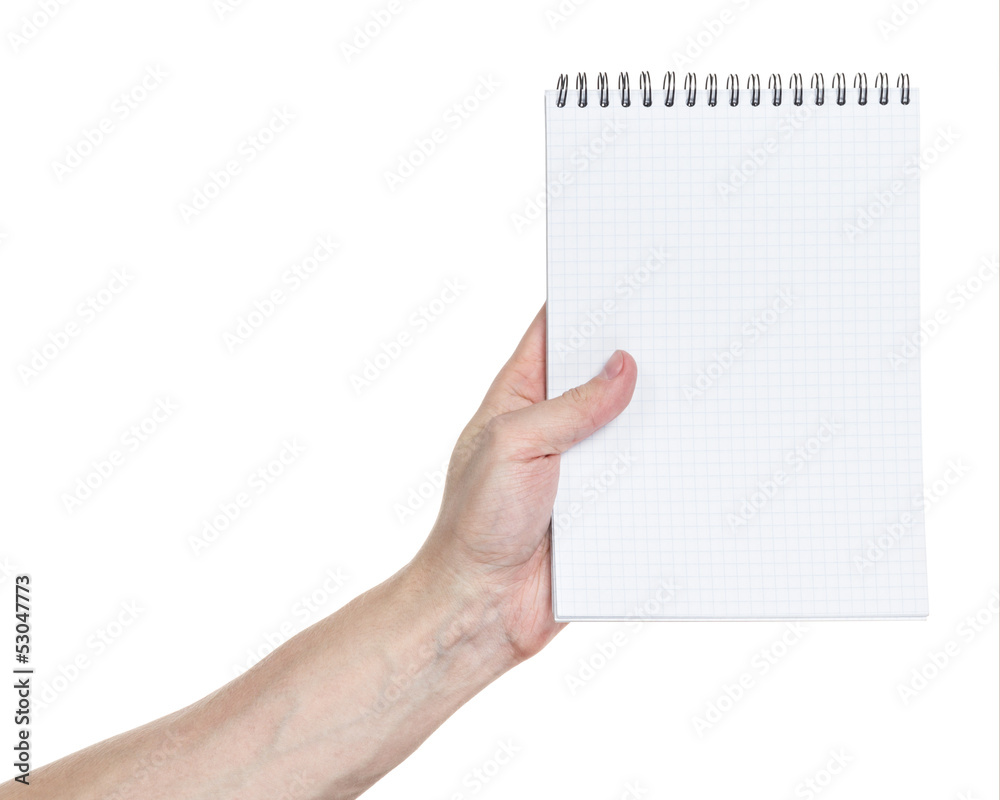 adult man hand holding notebook on a spring