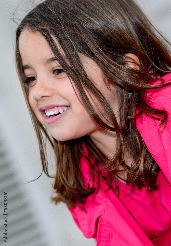 Fototapeta premium nice portrait of a happy pretty little girl