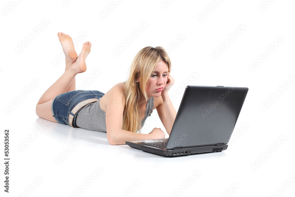 Beautiful woman bored with her old laptop Beautiful woman bored with her old laptop