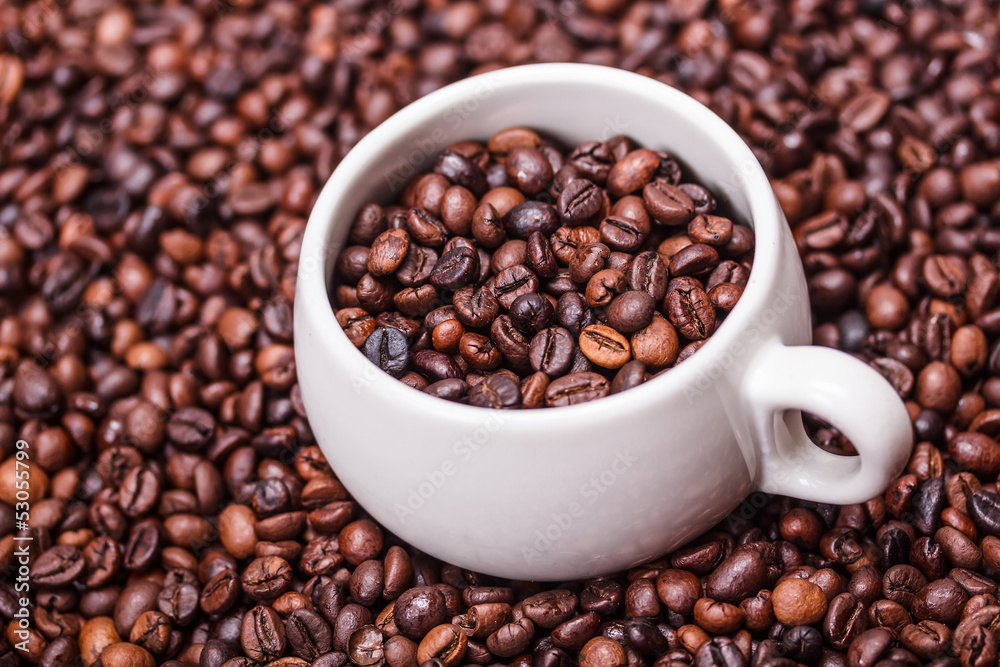 Cup with coffee beans