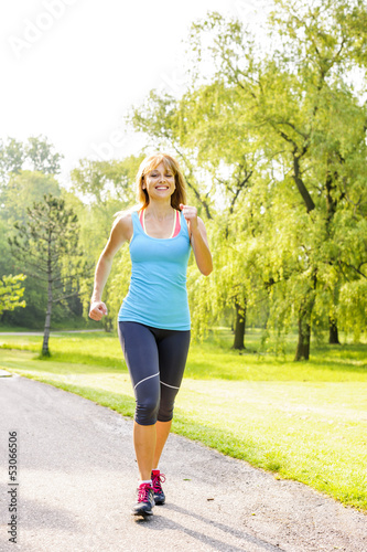 Woman running in park
