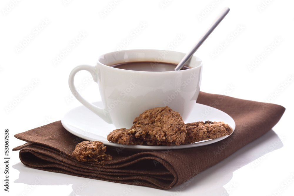 Hot chocolate in white cup on brawn table-napkin isolated on whi Hot chocolate in white cup on brawn table-napkin isolated on whi