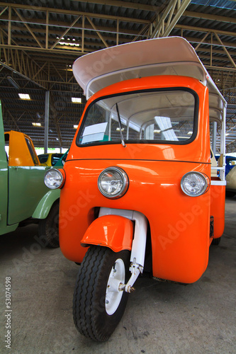 Tuk-tuk moto taxi on the street in bangkok, Thailand