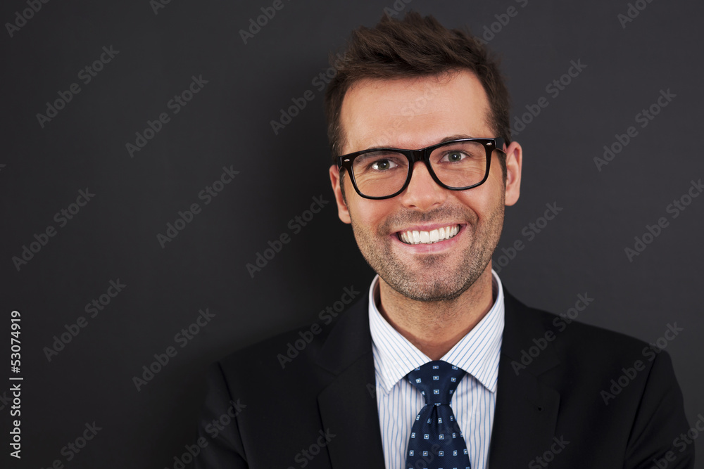 Portrait of handsome businessman wearing glasses . Portrait of handsome businessman wearing glasses .