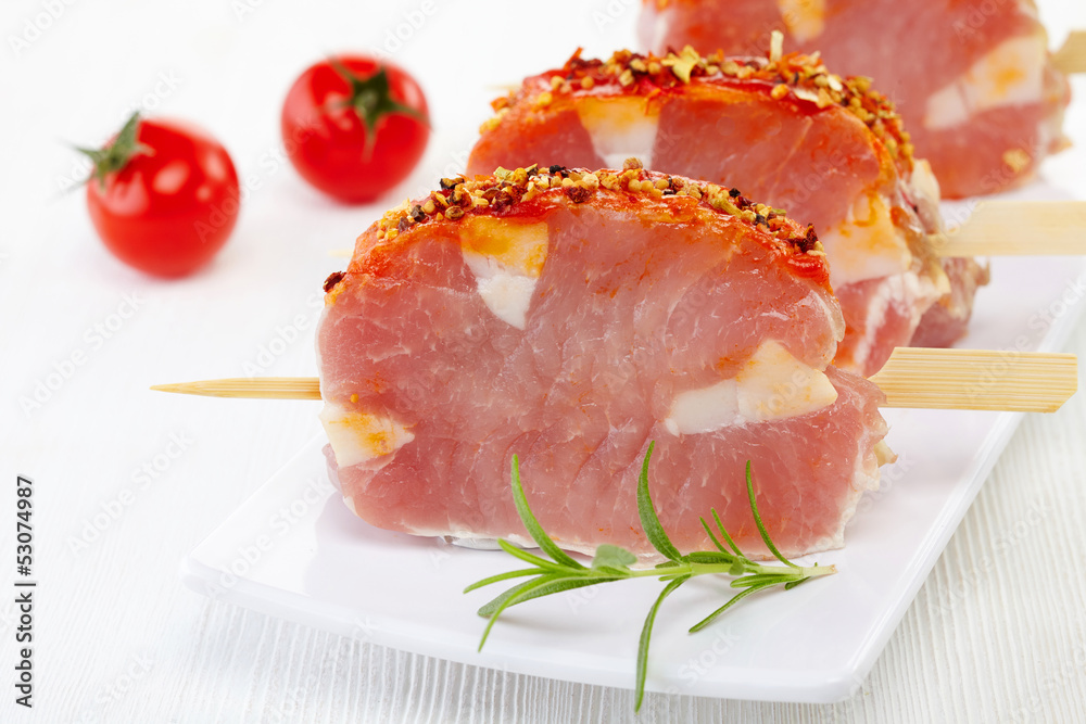 raw pork meat with spices for grill