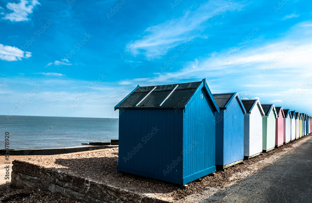 Bright Beach Huts at Felixstowe, Suffolk, England, UK Bright Beach Huts at Felixstowe, Suffolk, England, UK
