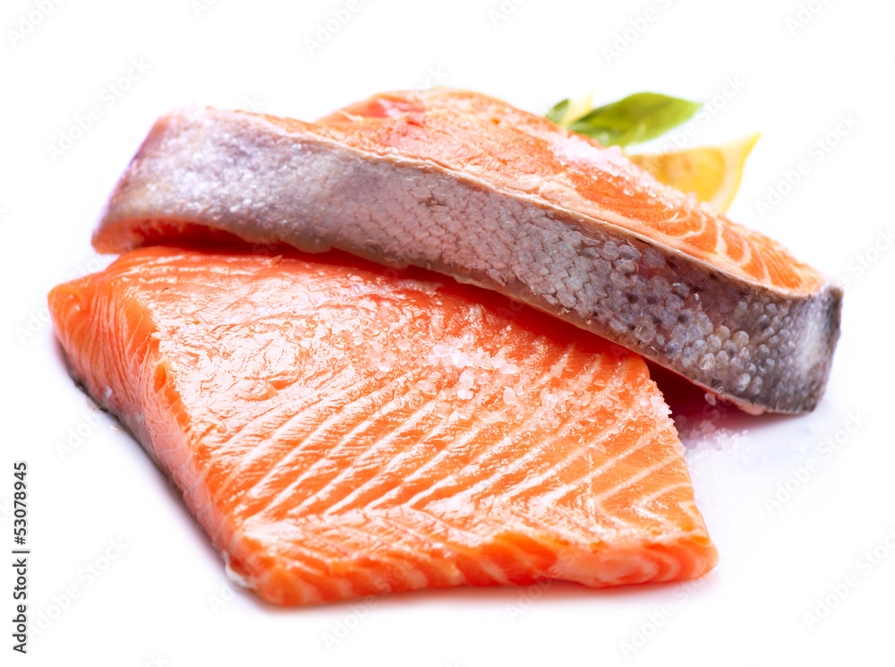 Salmon Raw Fillet. Red Fish isolated on a White Background Salmon Raw Fillet. Red Fish isolated on a White Background