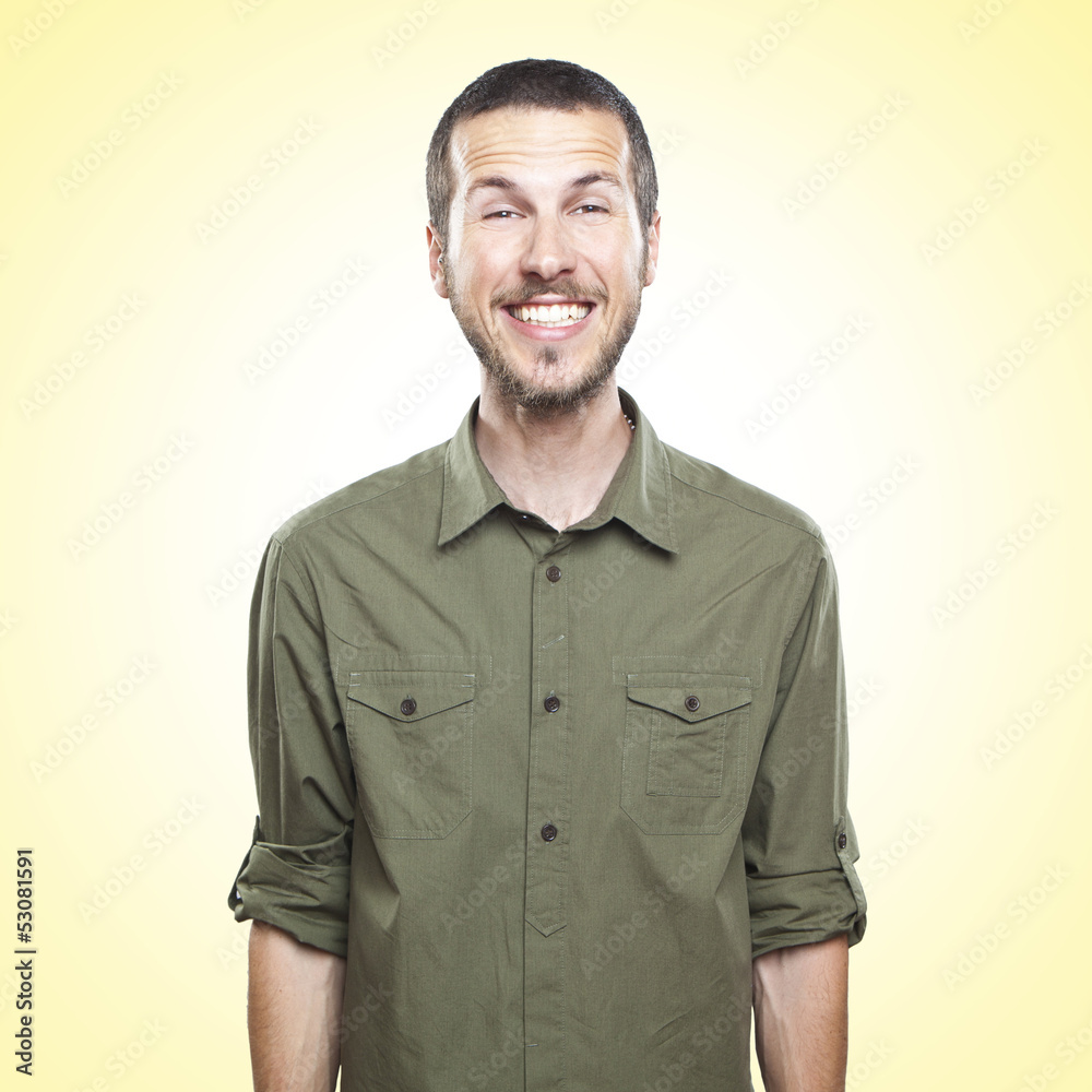 young man laughing, funny face expression young man laughing, funny face expression