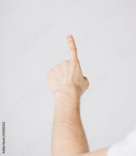 man hand pointing at something