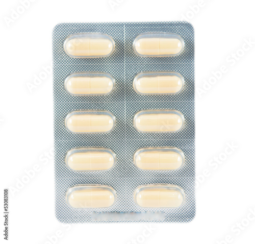 Fotografie, Tablou Yellow capsule in transparent blister pack