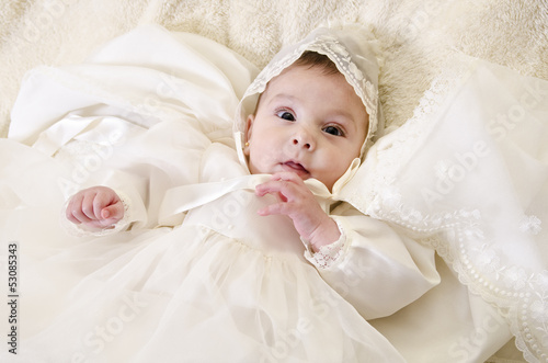 Fotografie, Obraz Little baby with ceremonial baptism clothes
