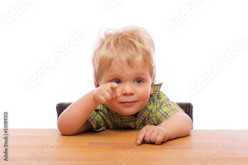 Obraz na płótnie Little child pointing finger to someone