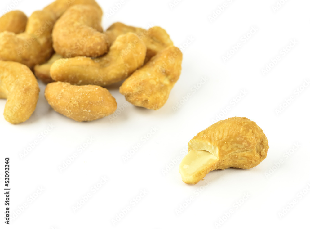 salted cashew nuts on white background salted cashew nuts on white background