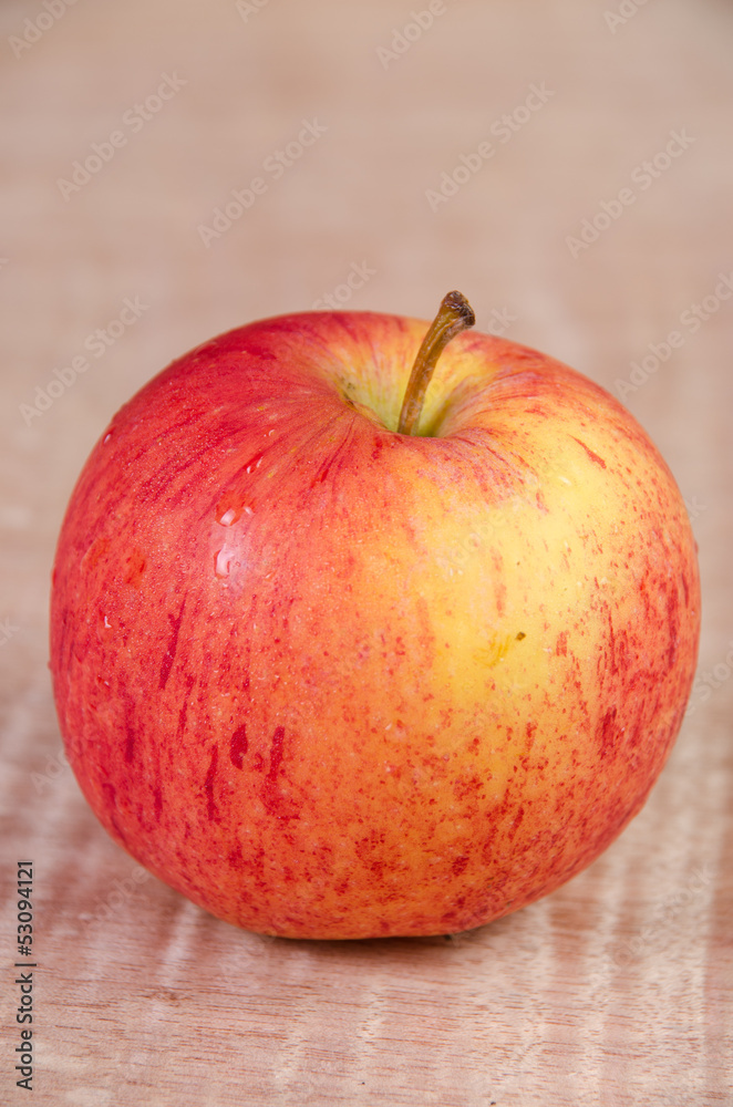Apples in basket on a wood background Apples in basket on a wood background