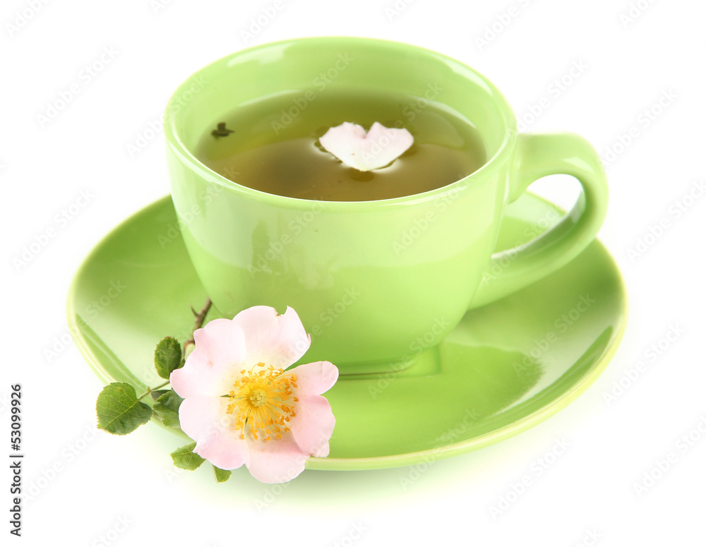Cup of herbal tea with hip rose flower, isolated on white Cup of herbal tea with hip rose flower, isolated on white