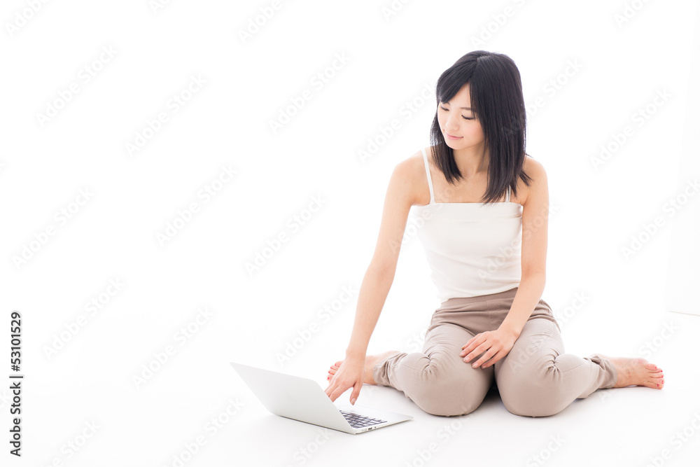 attractive asian woman using laptop