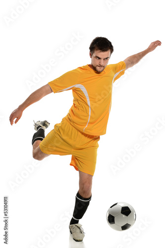 Fotografia, Obraz Soccer Player Kicking Ball