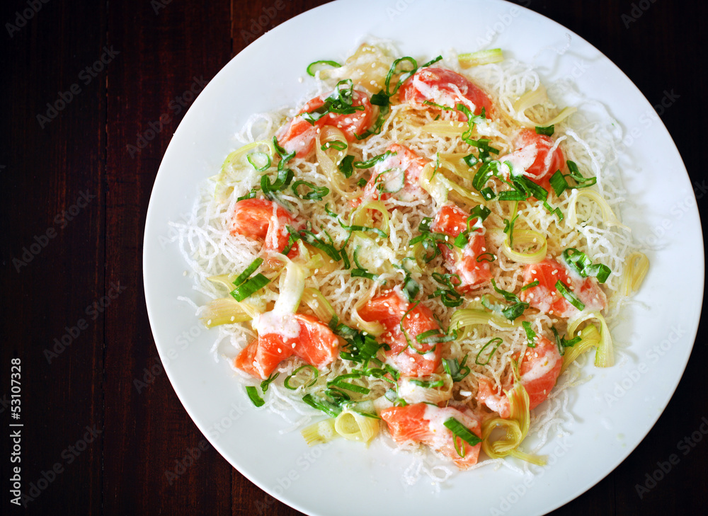 Fried crunchy rice noodles with salmon ceviche, sesame seeds Fried crunchy rice noodles with salmon ceviche, sesame seeds
