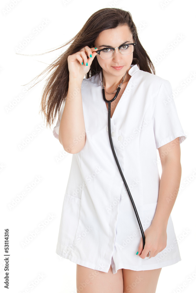 Sexy nurse with stethoscope. female doctor - isolated over a wh Sexy nurse with stethoscope. female doctor - isolated over a wh