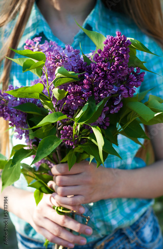 lilac branch in hand