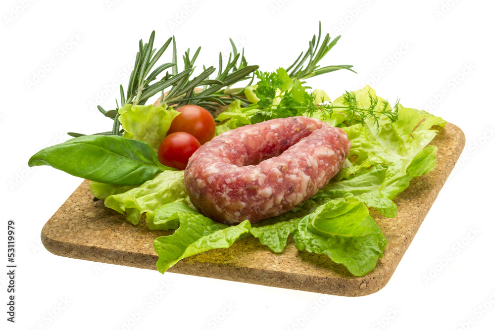 Salami with rosemary, salad and tomatoes Salami with rosemary, salad and tomatoes
