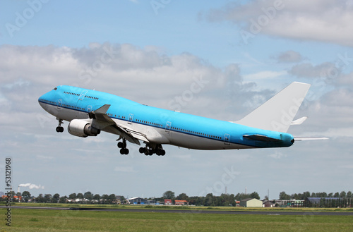 big blue plane taking off